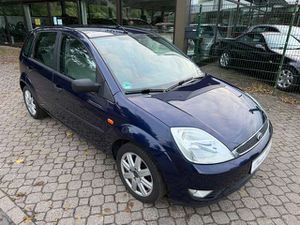 Ford-Fiesta-14 Ghia 1st *HU neu*Klima*eFH*ZV*Alu*Navi*NSW*,Vehicule second-hand