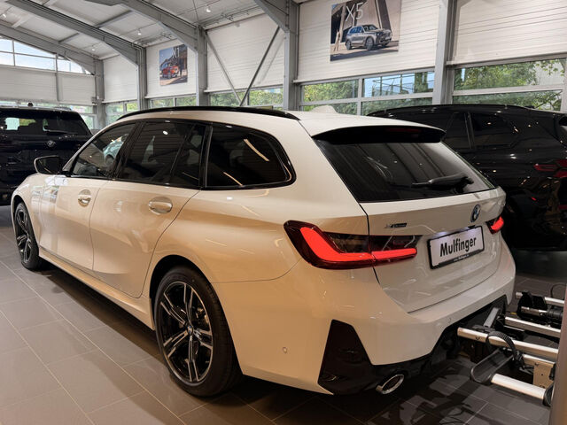 BMW 330 e Touring xDrive M Sportpaket AHK SHZ HiFi Navi LED Klima PDC el. Fenster Ansicht 5 für Fahrzeugdetailseite