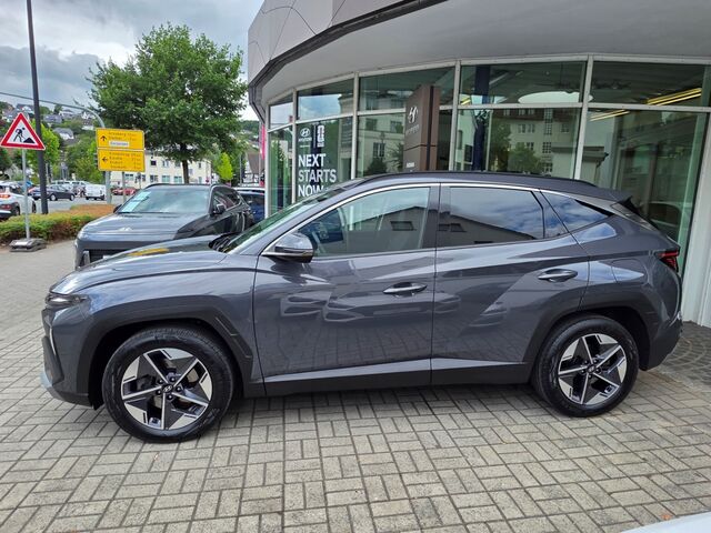 HYUNDAI TUCSON FL 1.6 CRDi 7-DCT 4WD TREND / AHK / Winterräder / Navi / Voll-LED / Kamera / Teilleder Ansicht 4 für Fahrzeugdetailseite