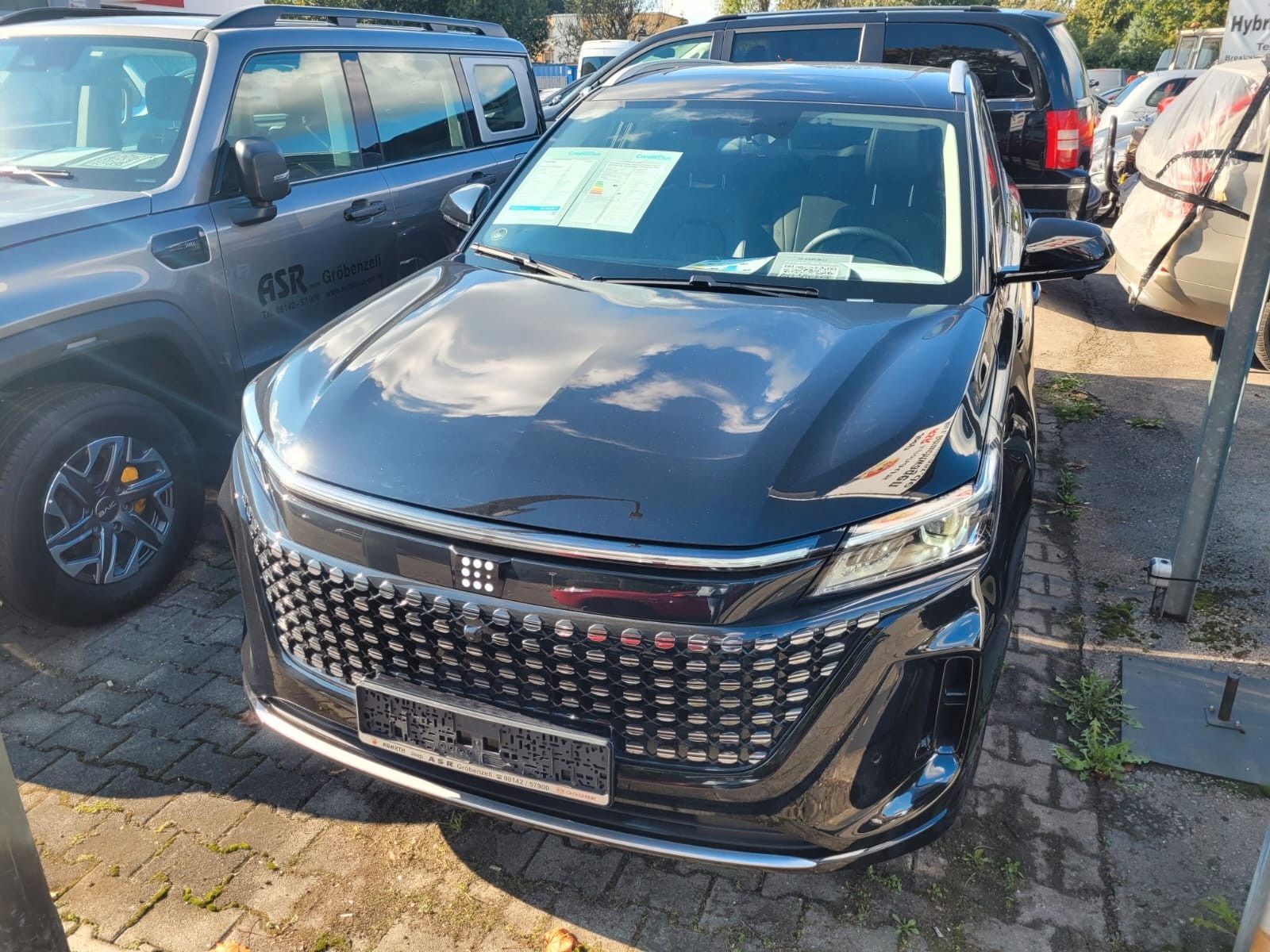 DFSK Fengon E5 PHEV 7 Sitzer Ansicht 2 für Fahrzeugdetailseite
