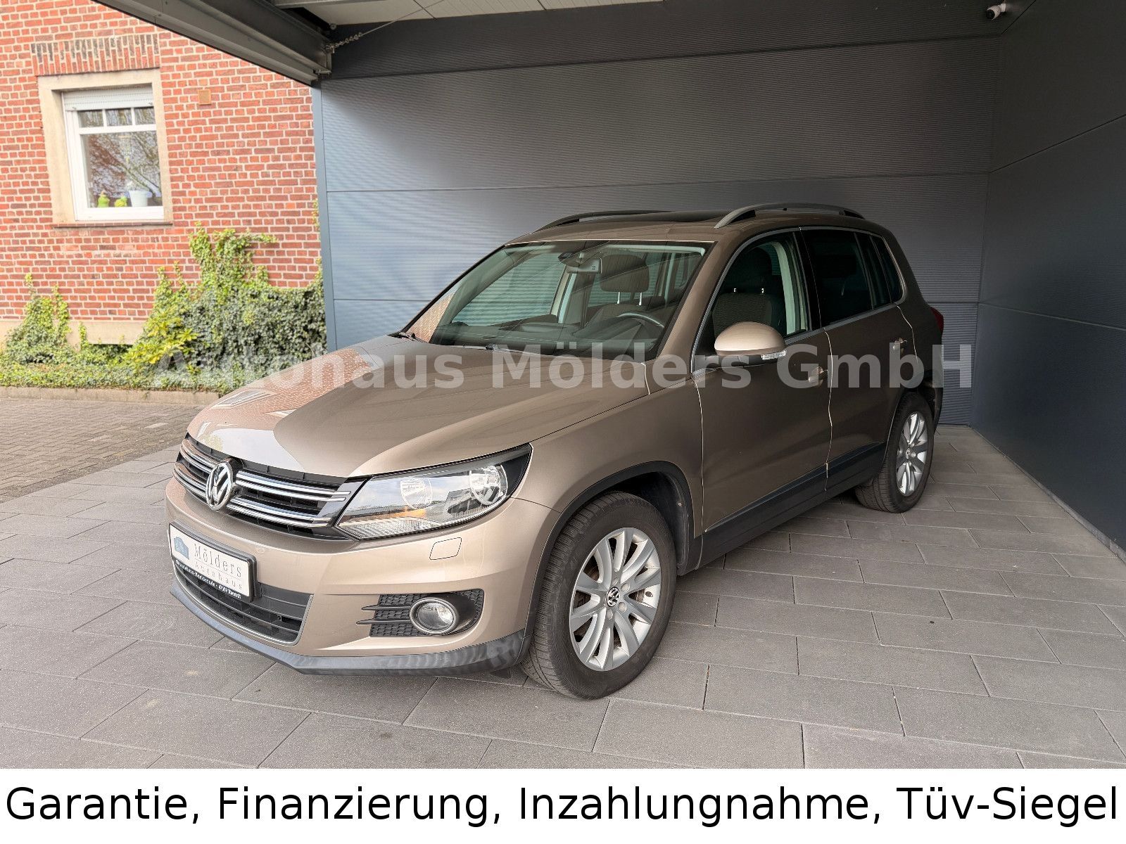 VW Tiguan Sport & Style*Garantie*Navi*PDC*159EUR mtl.